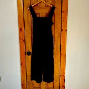 Madewell jump suit. Black and color. Darling open cut back. Size 2.